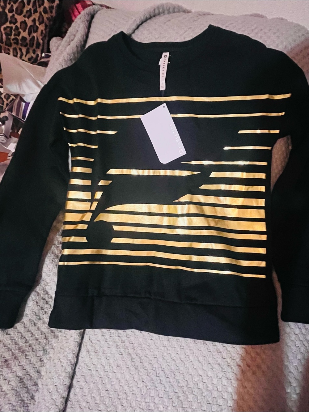 Fabletics Black Sweatshirt with Gold Stripe Graphic